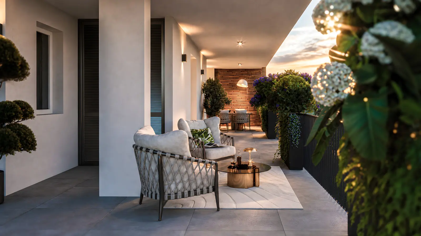Terrazzo con zona relax al tramonto